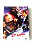 SIE LEBEN(THEY LIVES,JOHN CARPENTERS KLASSIKER 1998,RODY PIPER,MEG FOSTER,KEITH DAVID)LIM.MEDIABOOK F(33/150)OVP UNCUT 